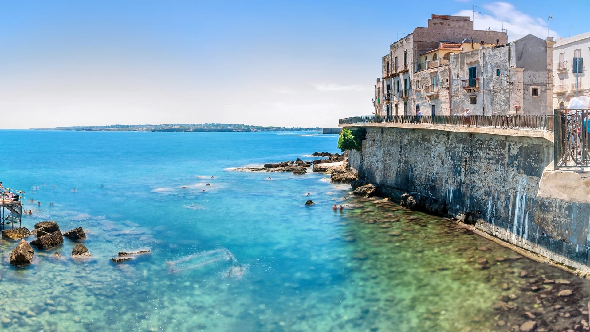 Ortigia seafront with turquoise sea, Syracuse