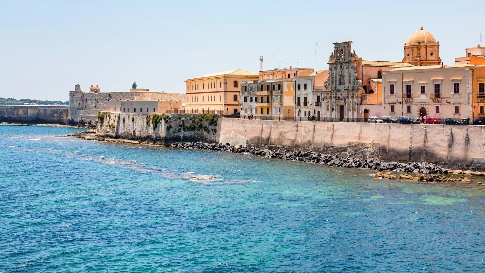 Ortigia riviera with historic buildings and Mediterranean light